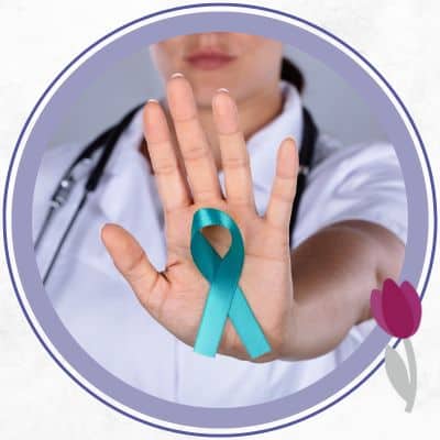 Doctor holding ovarian cancer blue ribbon
