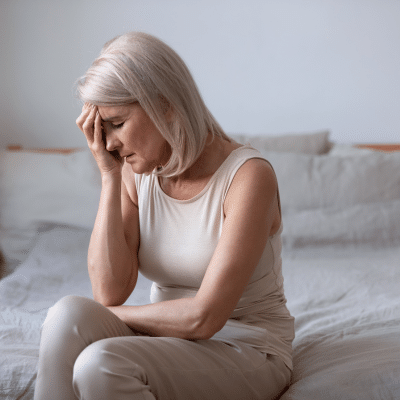Older woman dealing with menopause